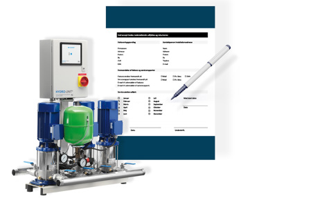 Hydro-unit pump system with control panel, alongside a form and pen.