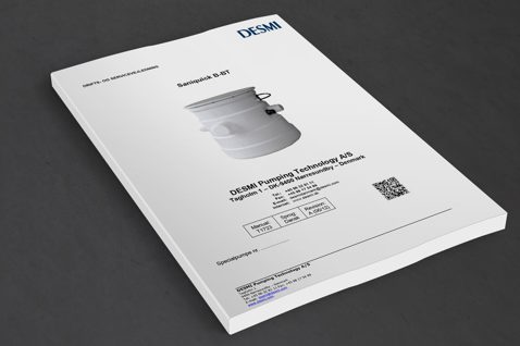 DESMI manual cover for Saniquick B-BT, featuring product image and contact details.