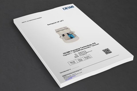DESMI Saniquick UF JFT manual cover on a gray surface.
