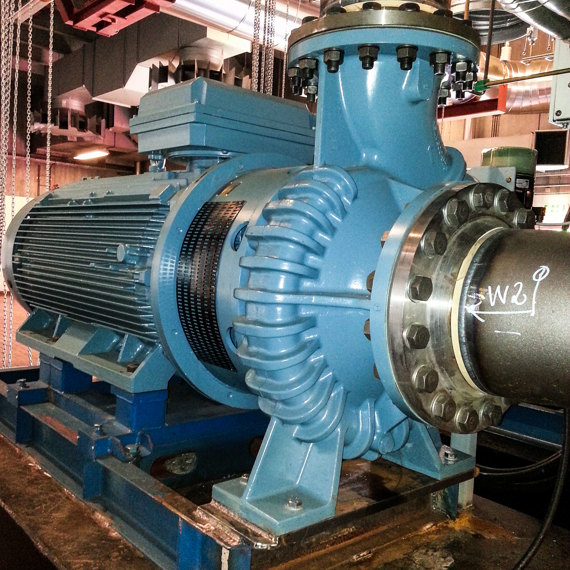 Industrial fluid handling system with DESMI equipment in a mechanical room.