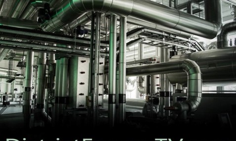 Industrial pipes and machinery in a facility, with "DistrictEnergyTV.com" text overlay.